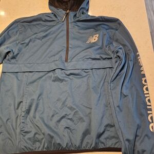 New Balance Blue Windbreaker Jacket with Lightweight Fabric and Full-Zip Design